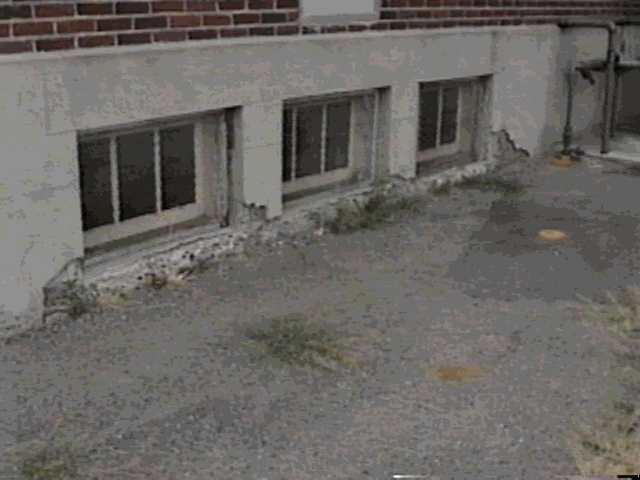 Crumbling Concrete Walls from Piling Snow